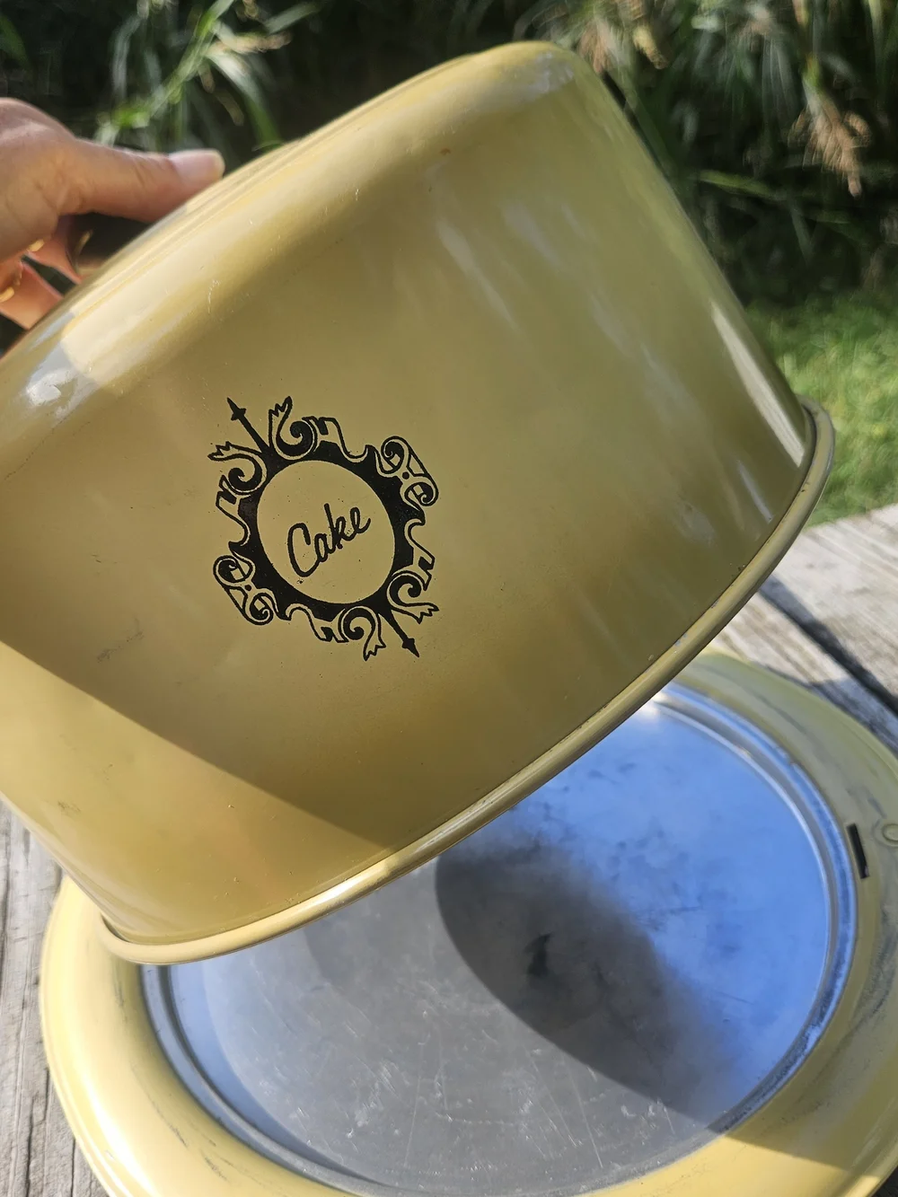 Yellow Cake Keeper with Decorative Emblem
